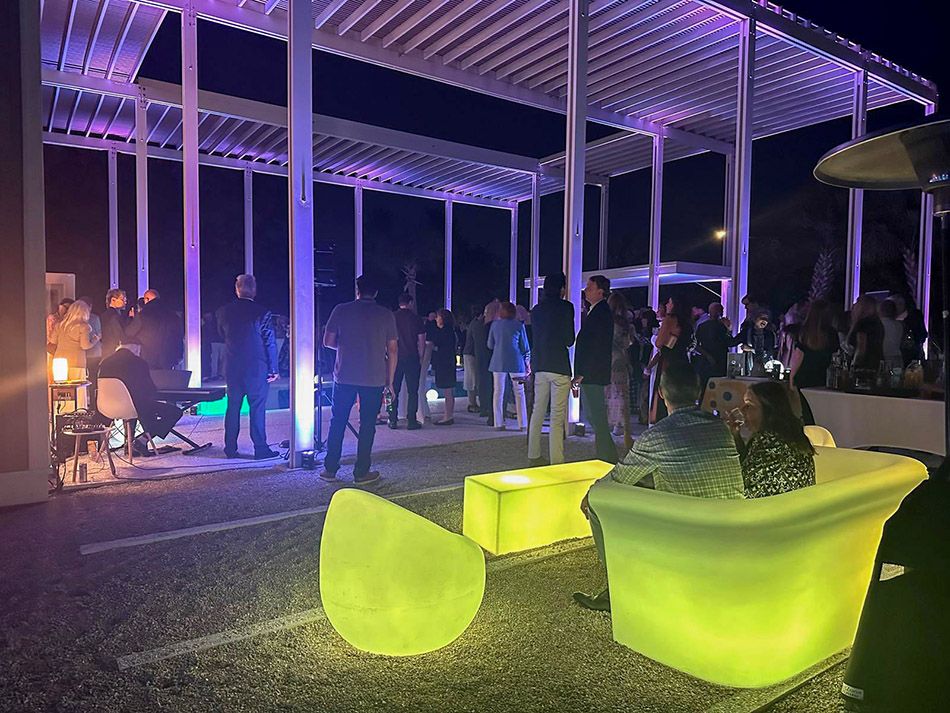 Luxury event furniture rental setup in Miami featuring modern lounge seating and cocktail tables