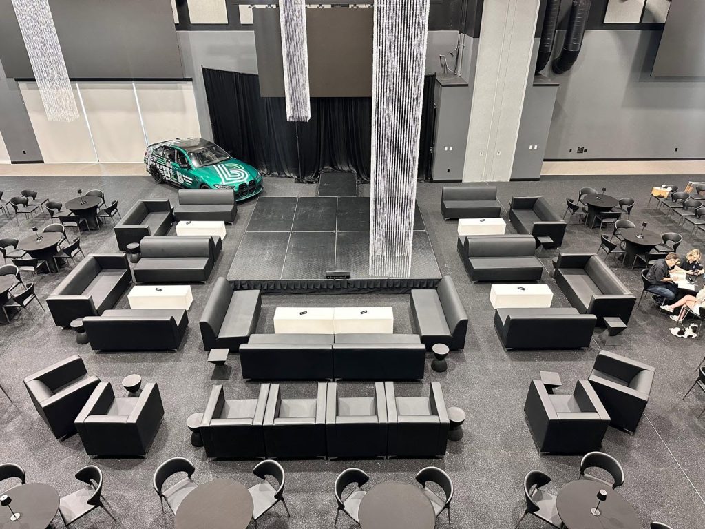 Black leather VIP furniture rental for an exclusive luxury event in Miami, Florida